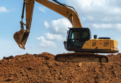 Excavator working on a construction site, representing Slamm Services' comprehensive asset maintenance and industrial solutions. Excavator working on a construction site, representing Slamm Services' comprehensive asset maintenance and industrial solutions.
